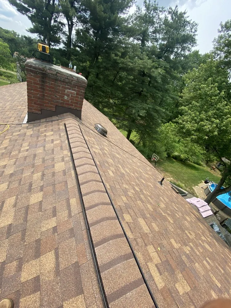 Slide of E.H. Roofing