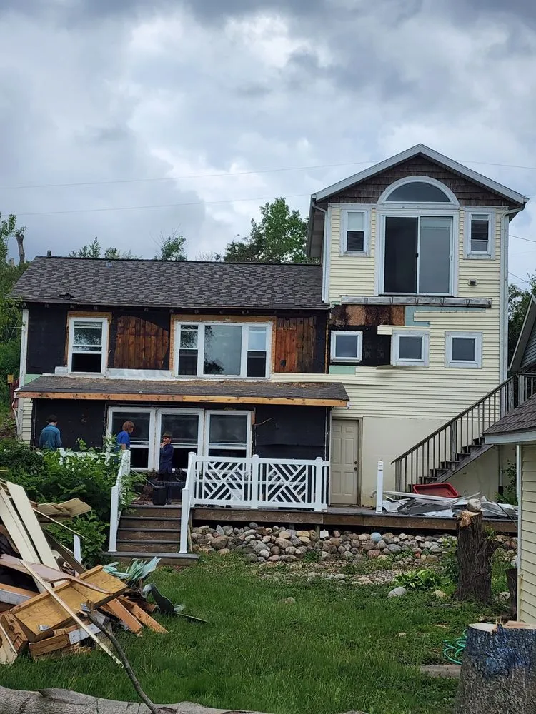 Slide of Eicher Roofing