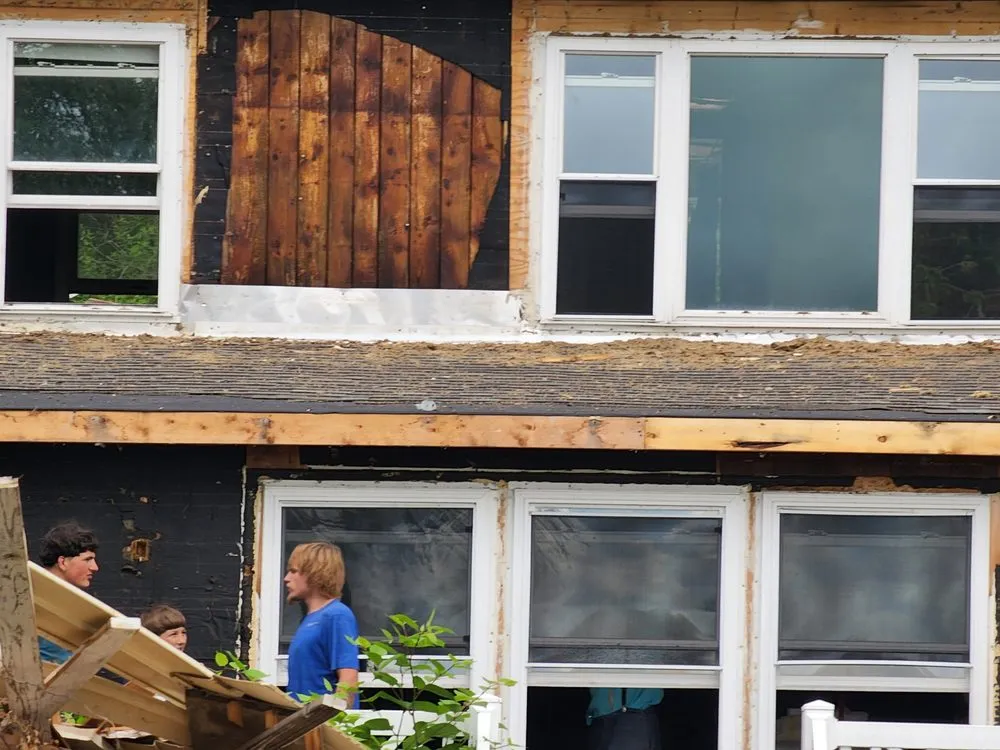 Slide of Eicher Roofing