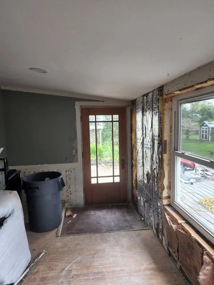 Slide of Eicher Roofing