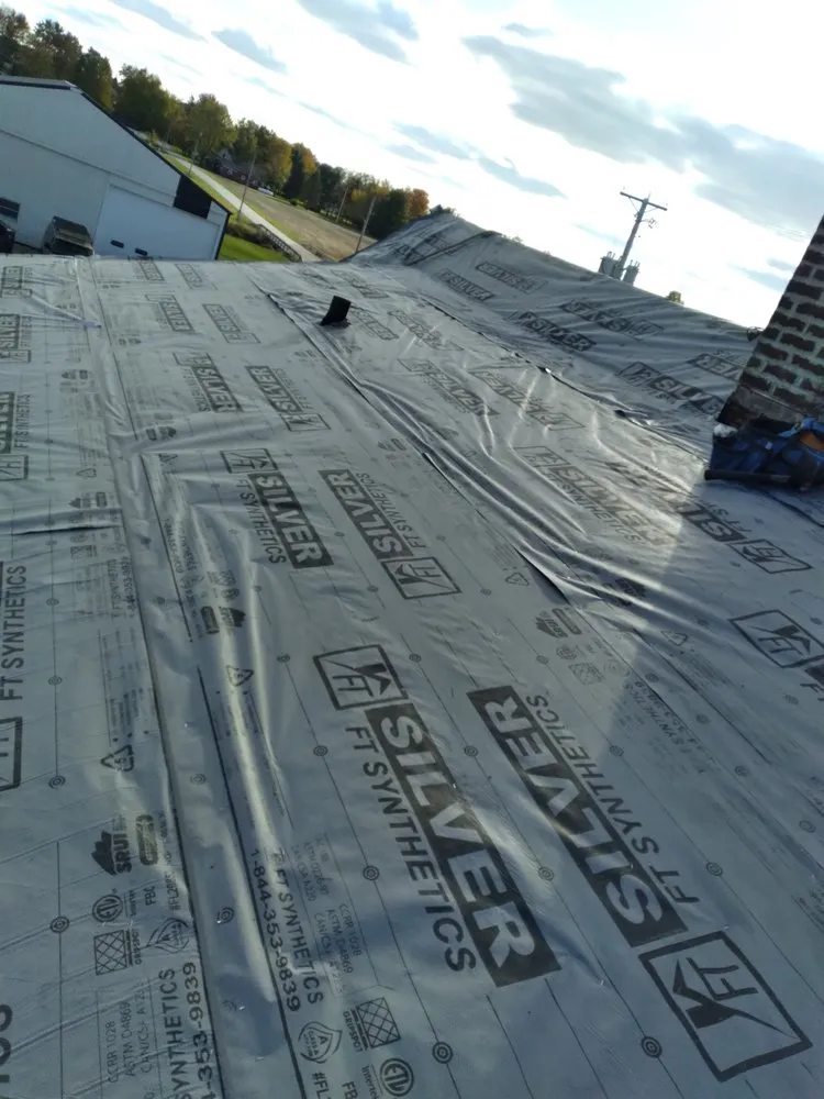 Slide of Eicher Roofing