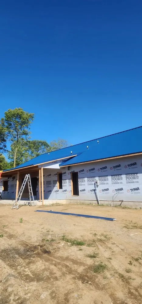 Slide of Eicher Roofing