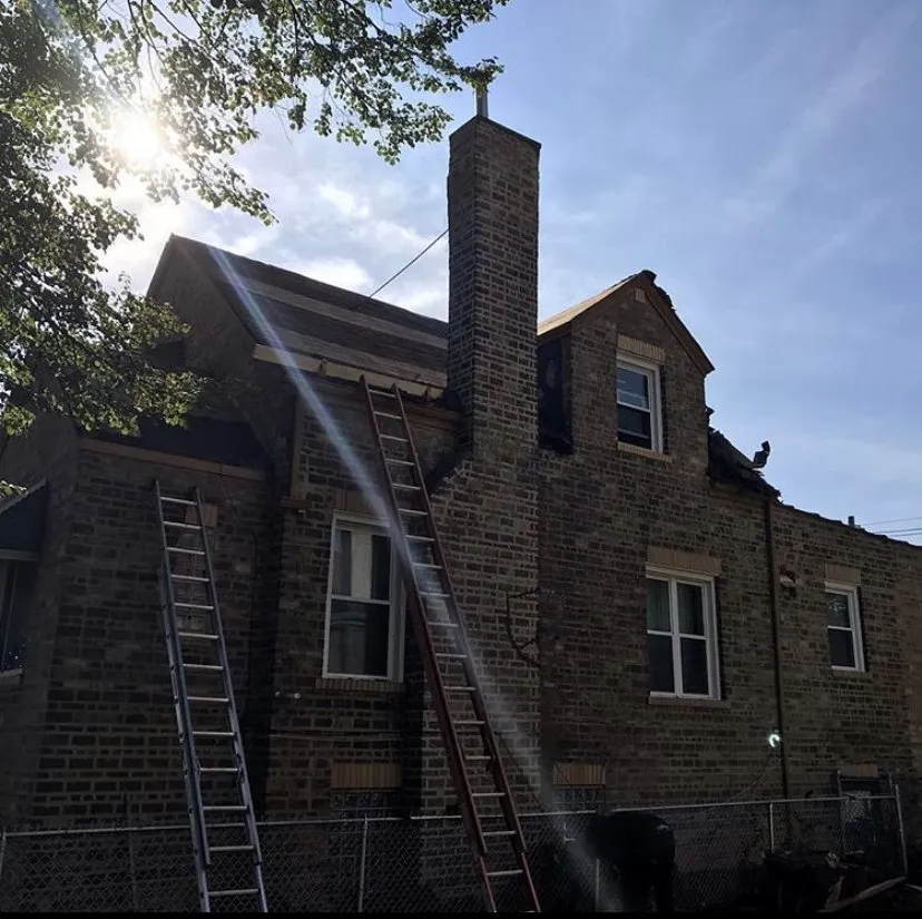 Slide of Eid Reliable Roofing and Masonry