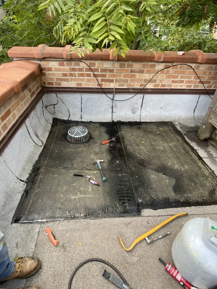 Slide of Eid Reliable Roofing and Masonry