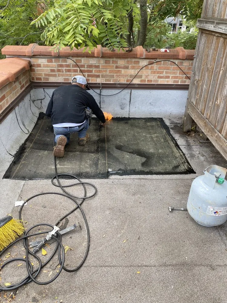 Slide of Eid Reliable Roofing and Masonry