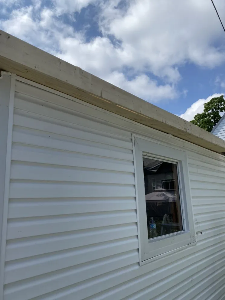 Slide of Eid Reliable Roofing and Masonry