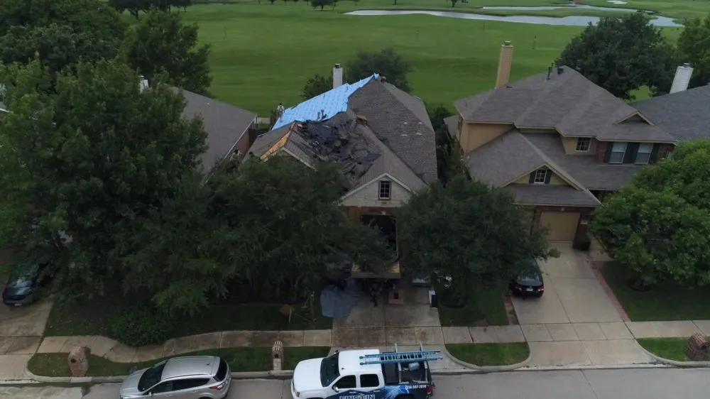 Slide of Einstein Roofing and Restoration