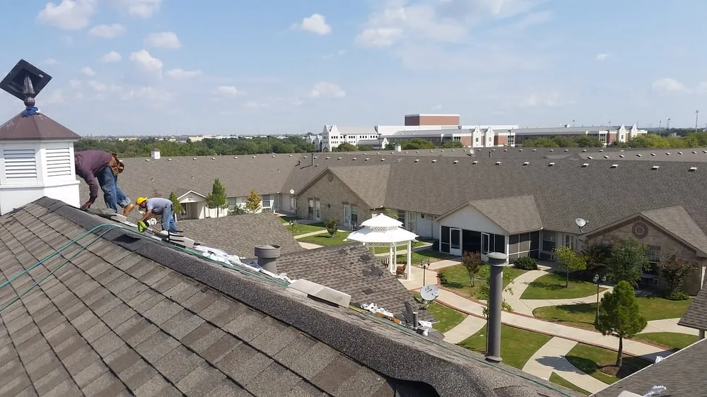 Slide of Einstein Roofing and Restoration