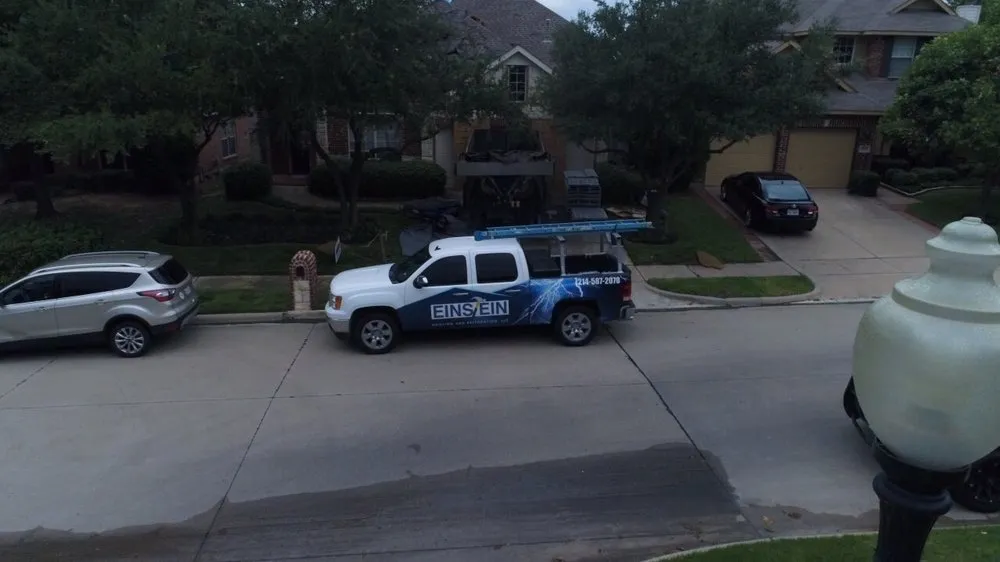 Slide of Einstein Roofing and Restoration
