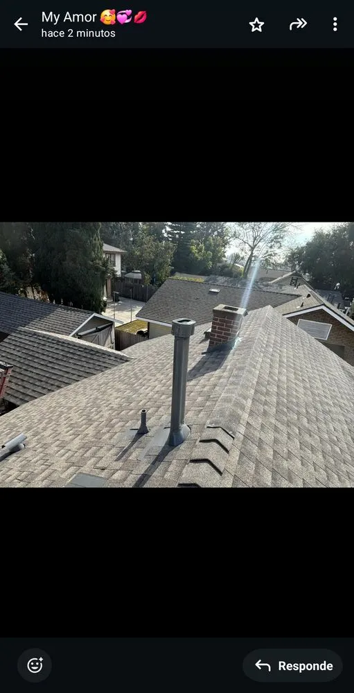 Slide of E&J Roof Service