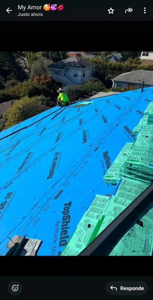 Slide of E&J Roof Service