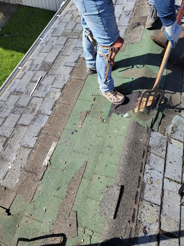 Slide of E&J roofing and construction