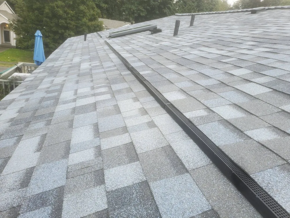 Slide of E&J roofing and construction