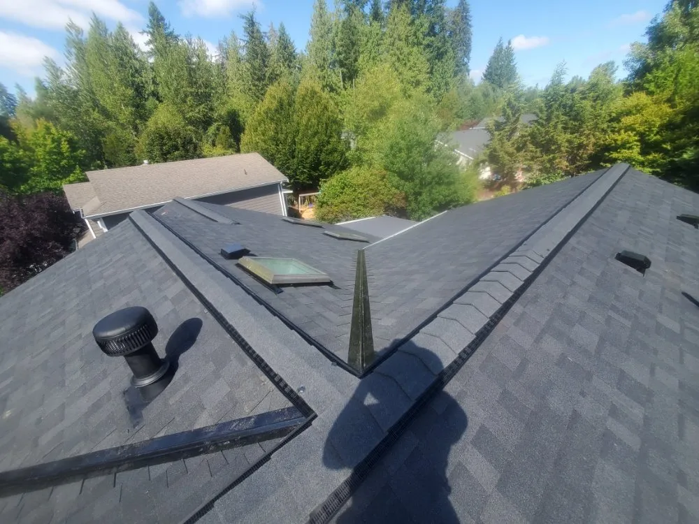 Slide of E&J roofing and construction