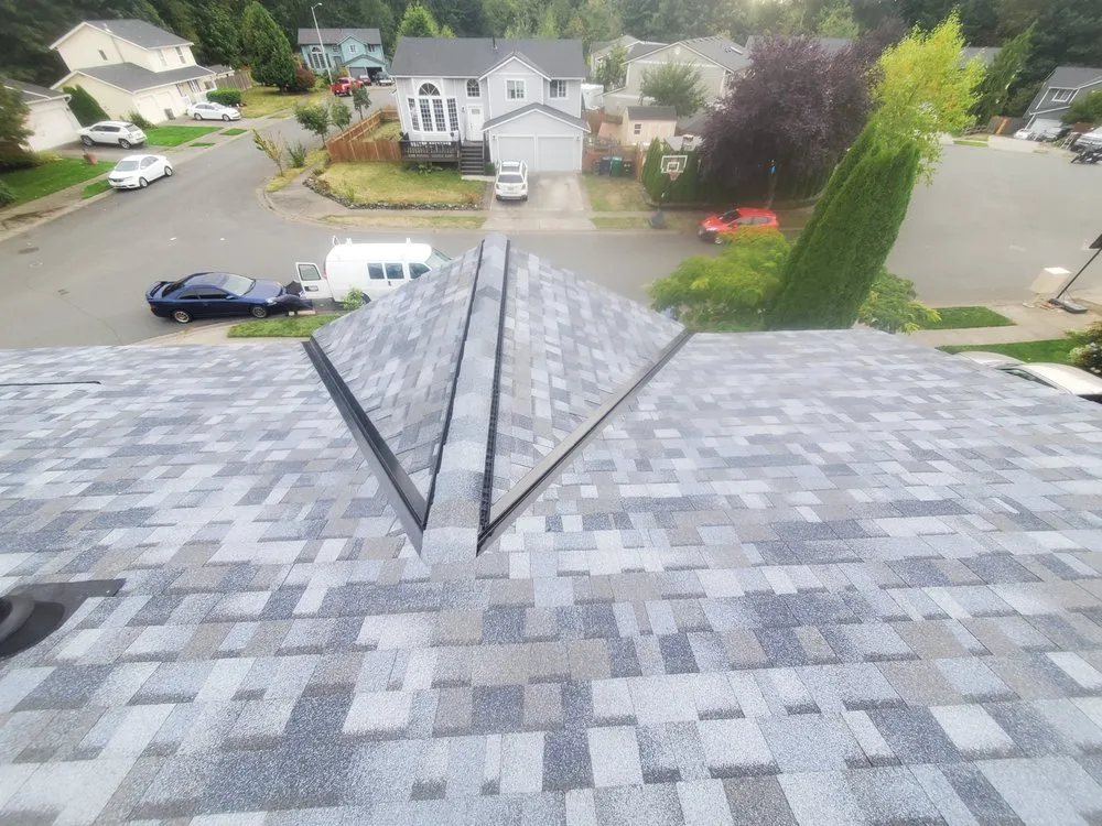 Slide of E&J roofing and construction