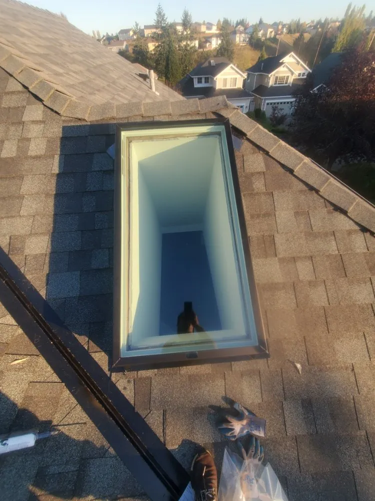 Slide of E&J roofing and construction