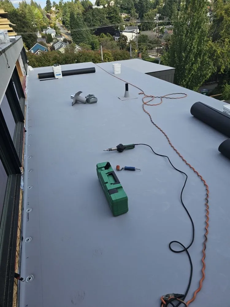 Slide of E&J roofing and construction