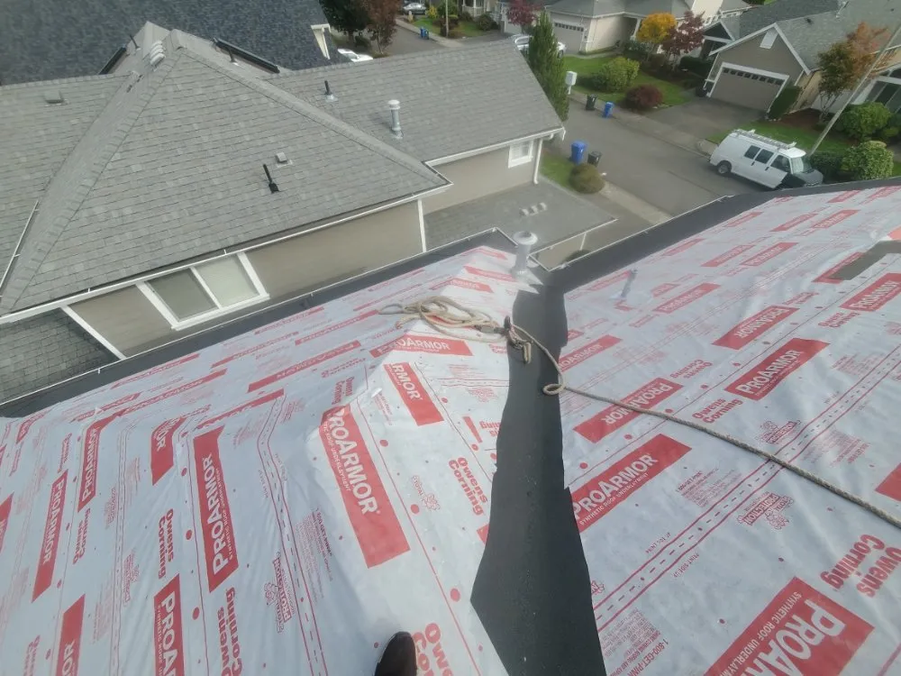 Slide of E&J roofing and construction