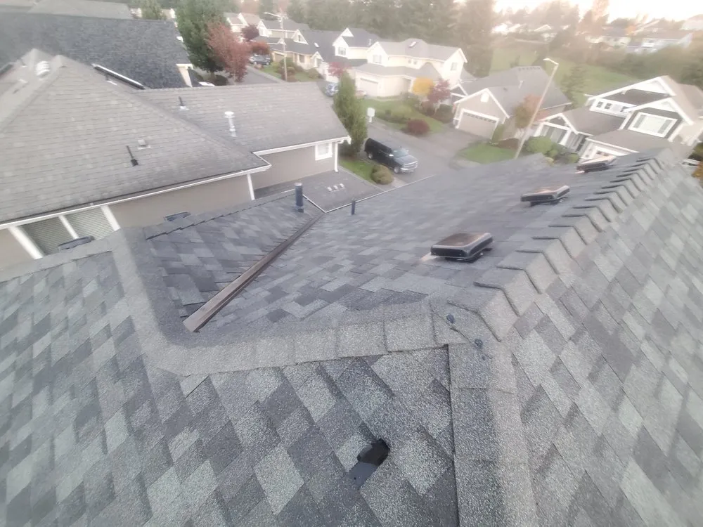 Slide of E&J roofing and construction