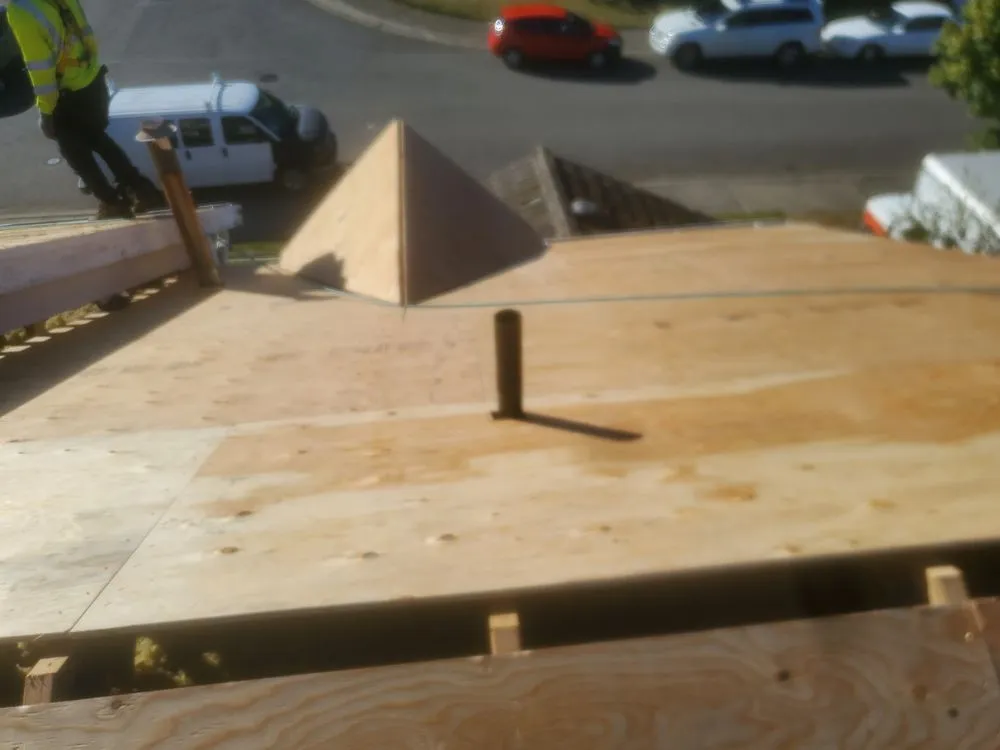 Slide of E&J roofing and construction