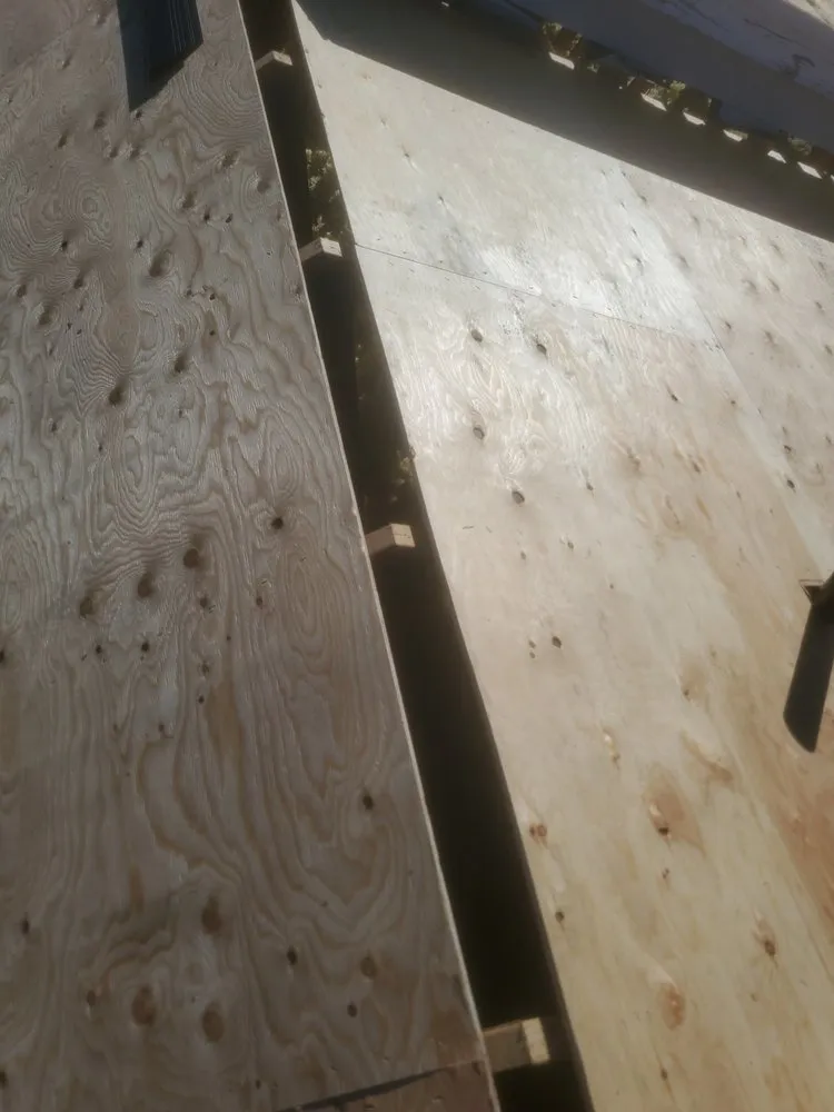 Slide of E&J roofing and construction