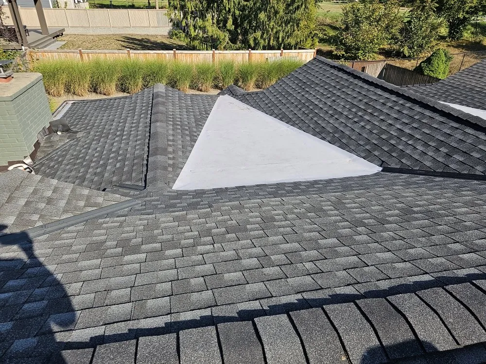 Slide of E&J roofing and construction