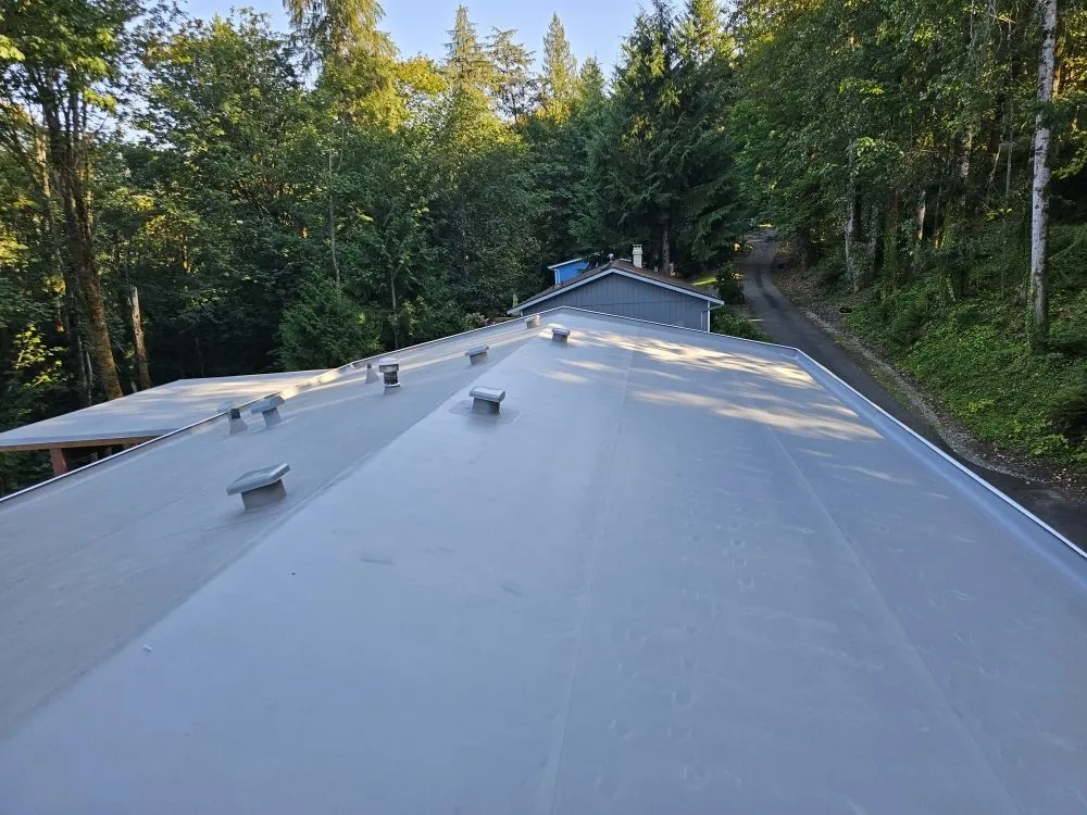 Slide of E&J roofing and construction