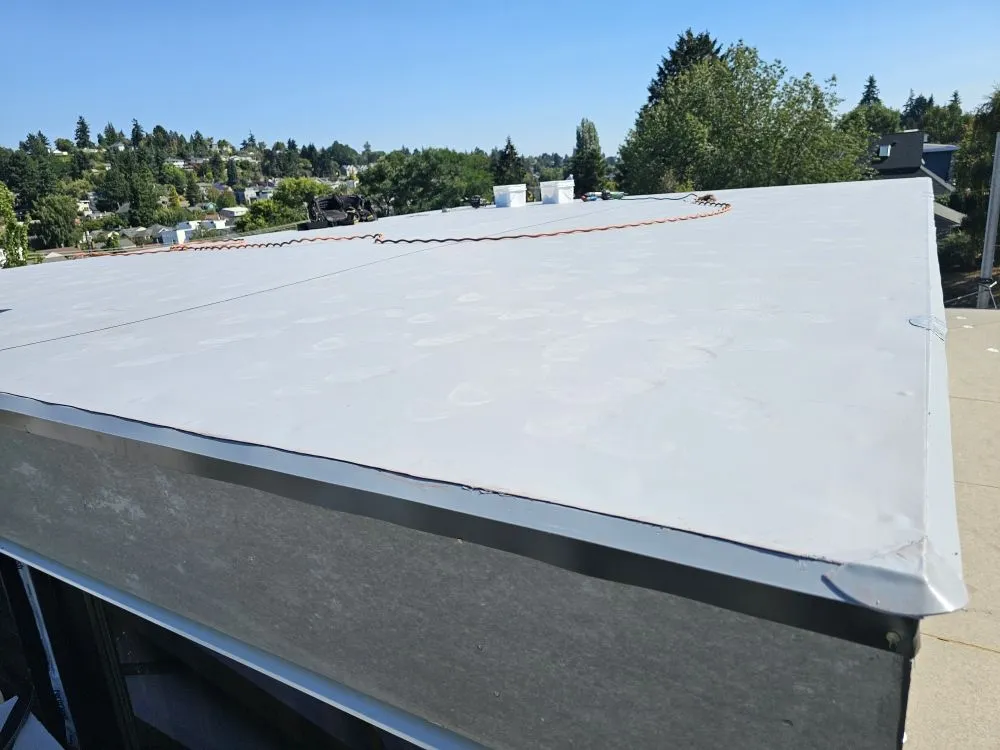 Slide of E&J roofing and construction