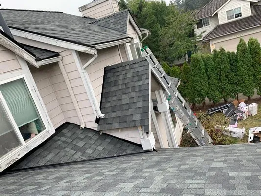 E&J roofing and construction Logo