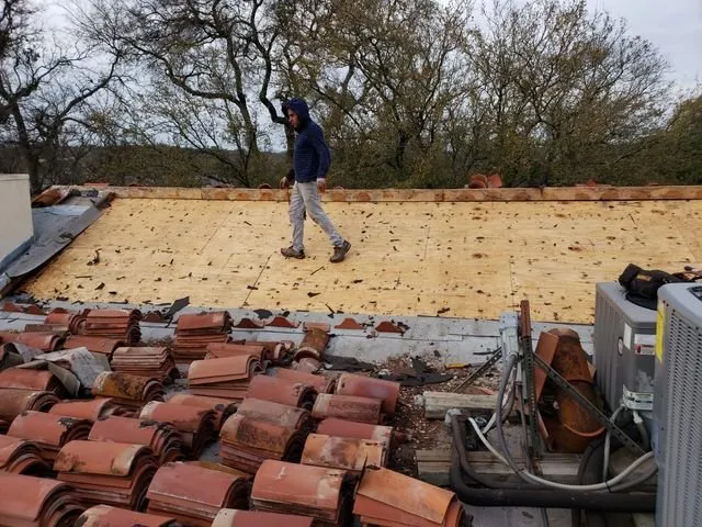 Slide of EJM Roofing & Remodeling