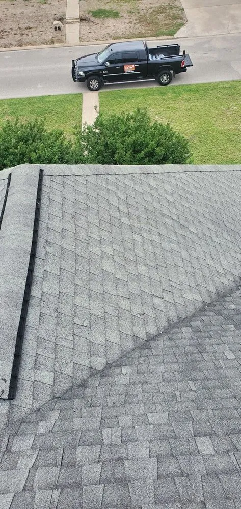 Slide of EJM Roofing & Remodeling