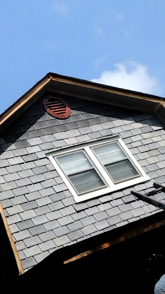 Slide of El Potosino Roofing and Construction