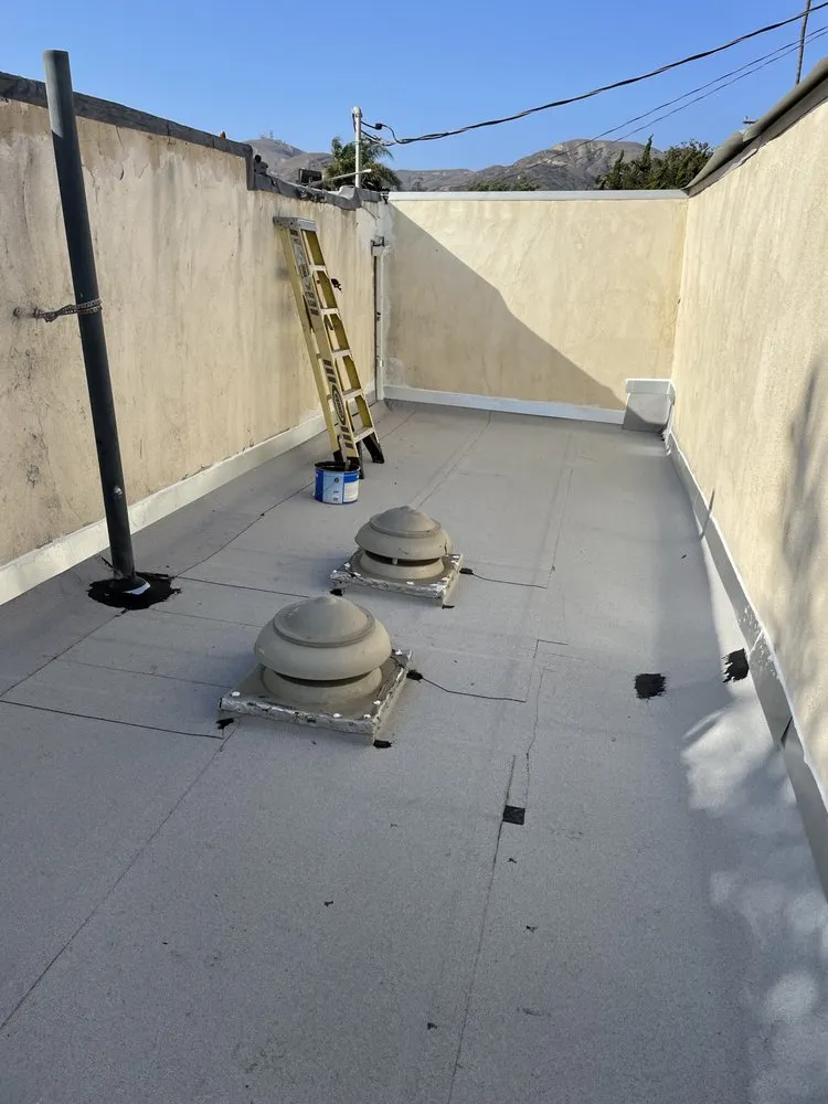 Slide of El Puma Roofing