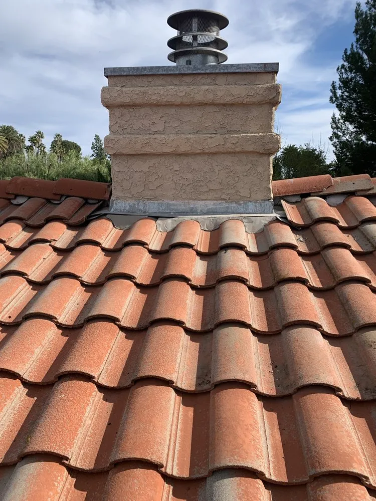 Slide of El Puma Roofing