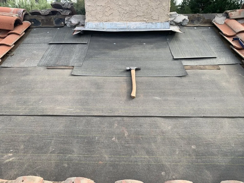 Slide of El Puma Roofing