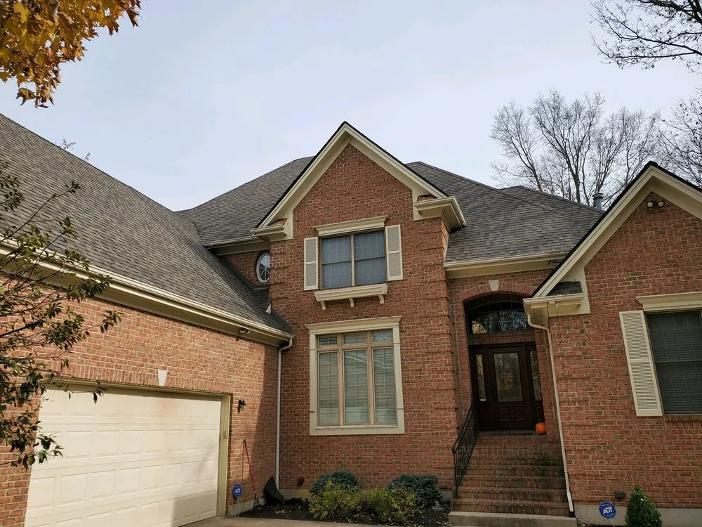 Slide of E&L Roofing