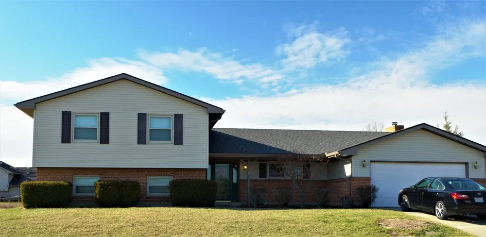 Slide of E&L Roofing