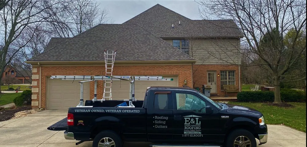 Slide of E&L Roofing