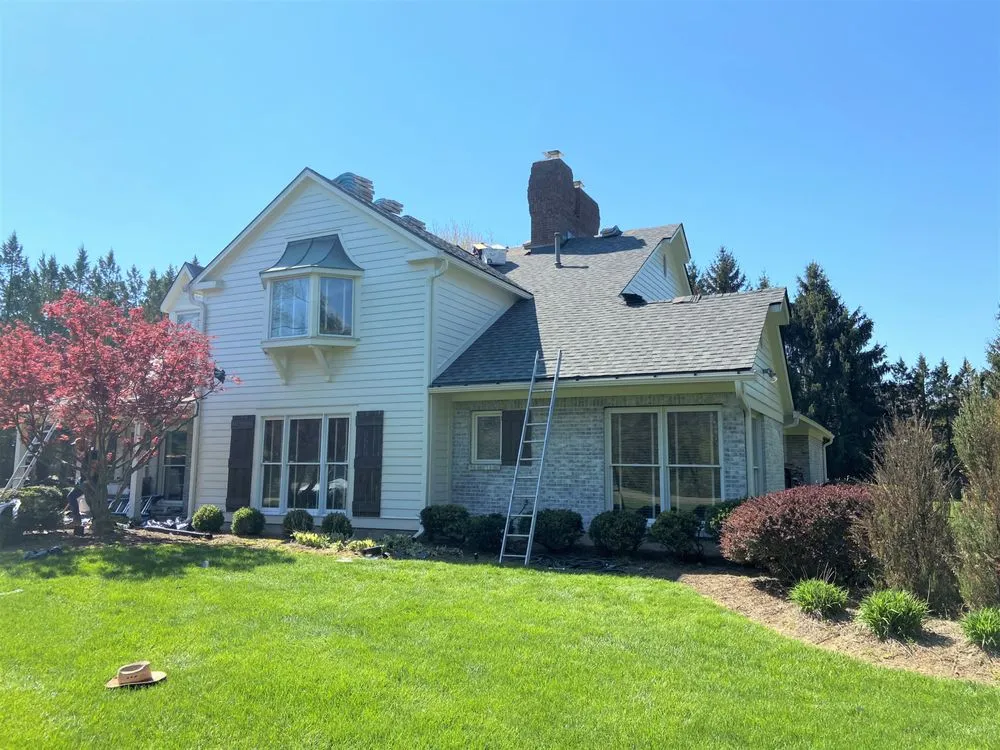 Slide of E&L Roofing