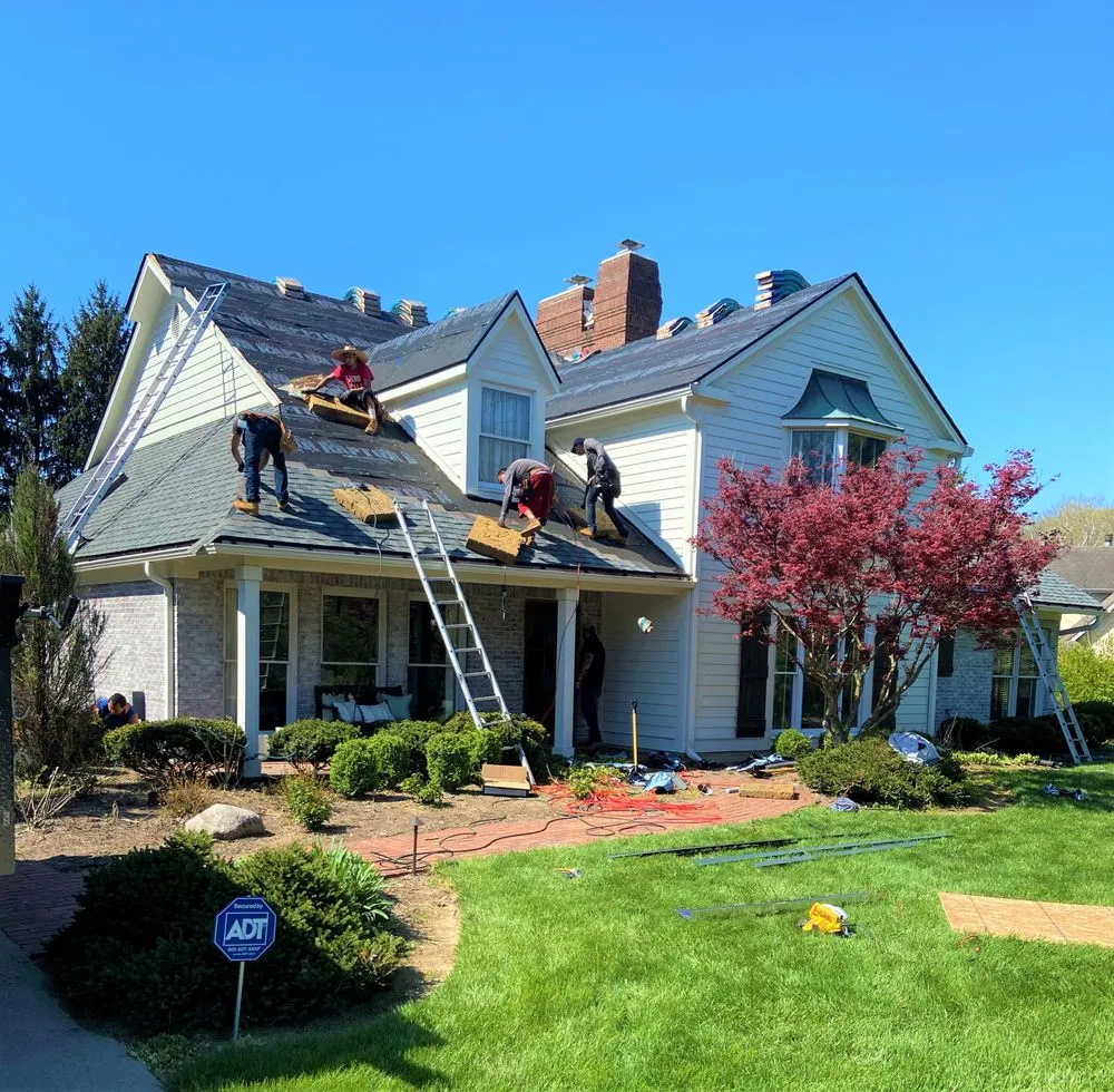 Slide of E&L Roofing