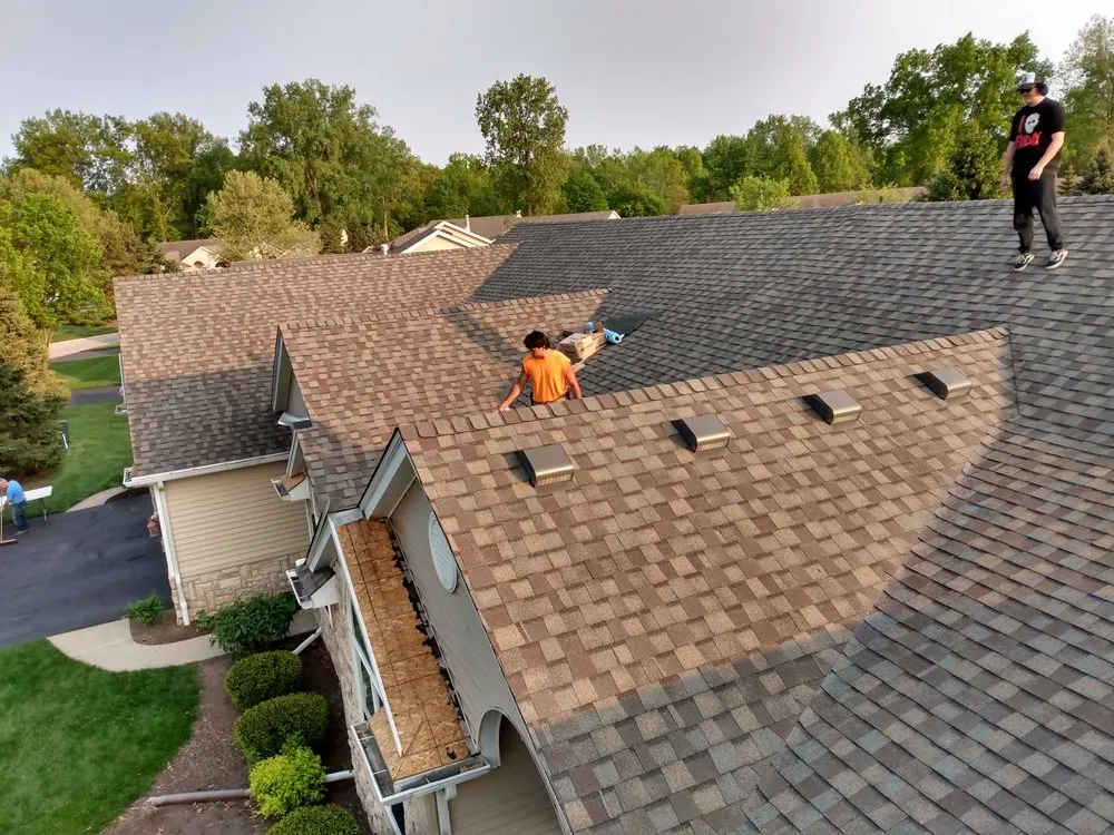 Slide of Elam Roofing