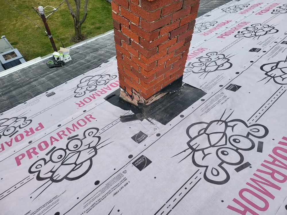 Slide of Elam Roofing