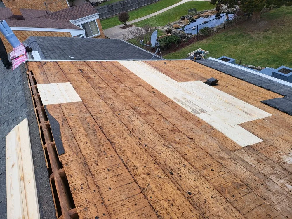 Slide of Elam Roofing