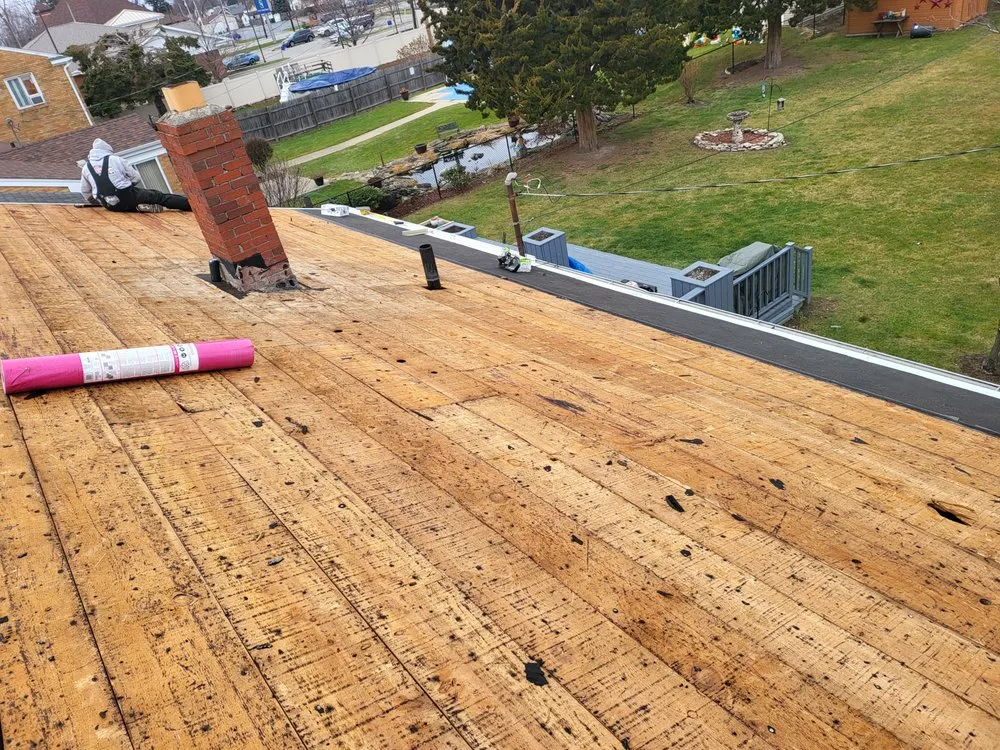 Slide of Elam Roofing