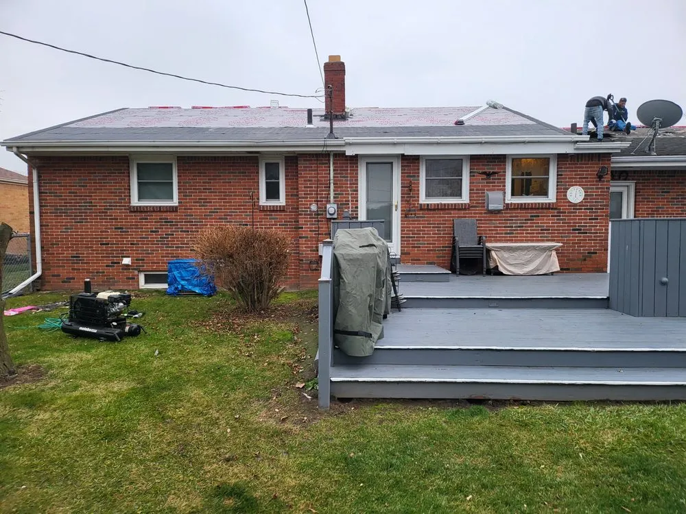 Slide of Elam Roofing