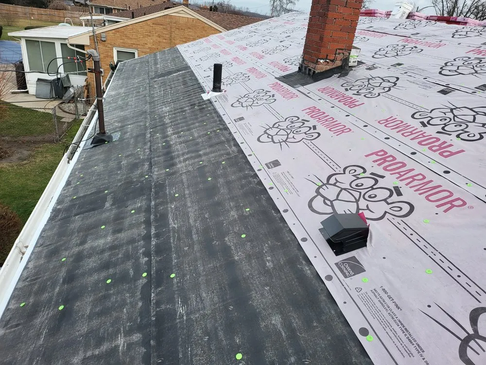 Slide of Elam Roofing