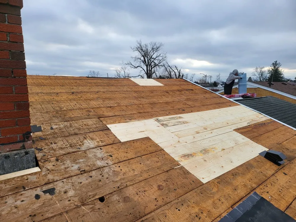 Slide of Elam Roofing