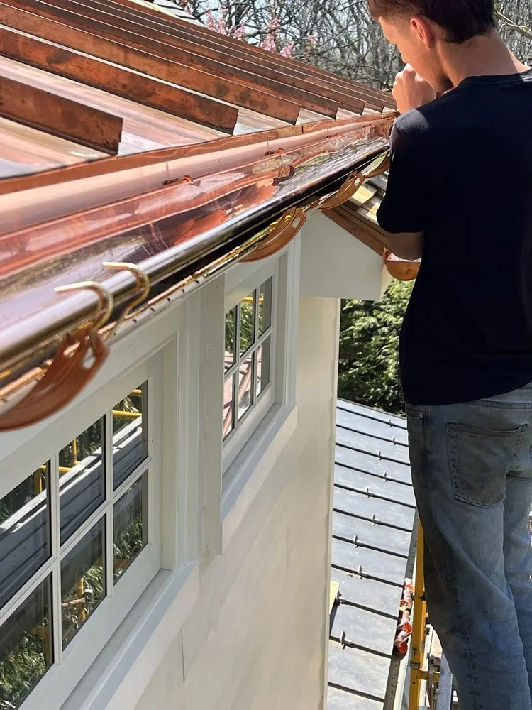 Slide of Elazer Company Roofing & Repairs