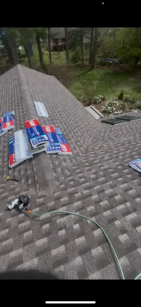 Slide of Elazer Company Roofing & Repairs