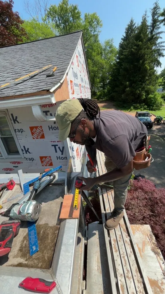 Slide of Elazer Company Roofing & Repairs